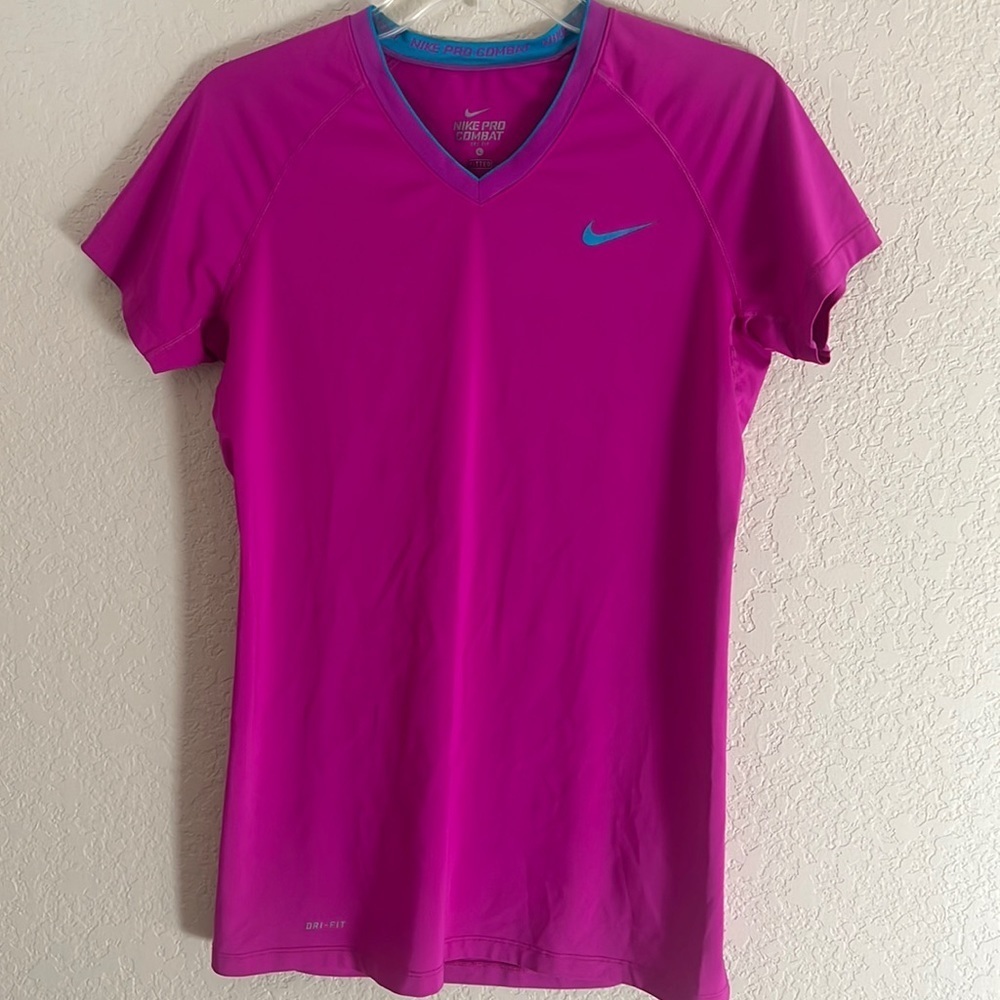 Nike pro combat hot pink/blue trim women’s top. Size L.